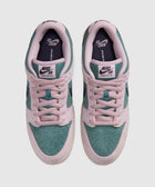 Nike SB Dunk Low Pro sneakers in teal and light pink suede, top view