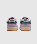 Back view of two-tone suede and leather low-top sneakers in green and lavender with gum soles