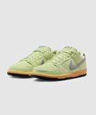 Pale green suede low-top sneakers with gray swoosh and gum sole, men's streetwear shoes