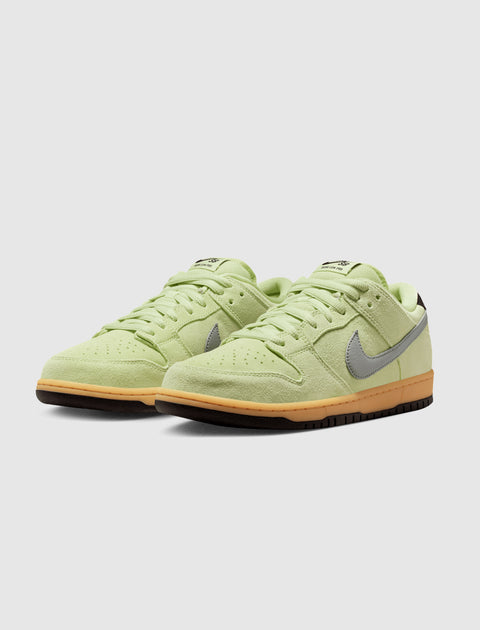 Pale green suede low-top sneakers with gray swoosh and gum sole, men's streetwear shoes