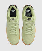Nike SB Dunk Low Pro sneakers in light green suede with gum outsole, top view