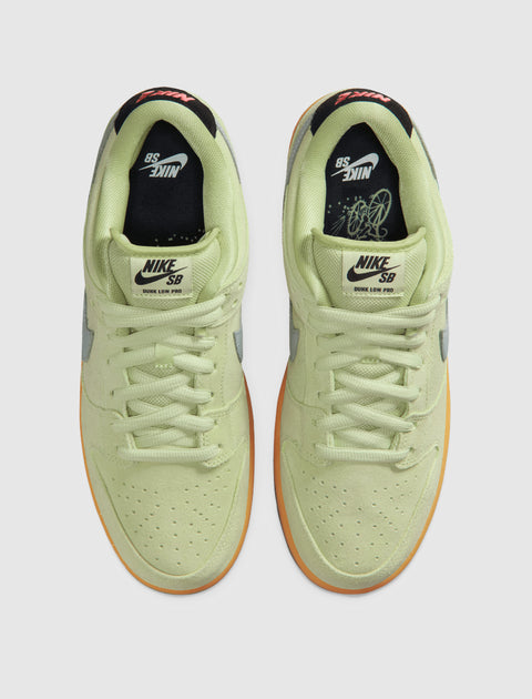 Nike SB Dunk Low Pro sneakers in light green suede with gum outsole, top view