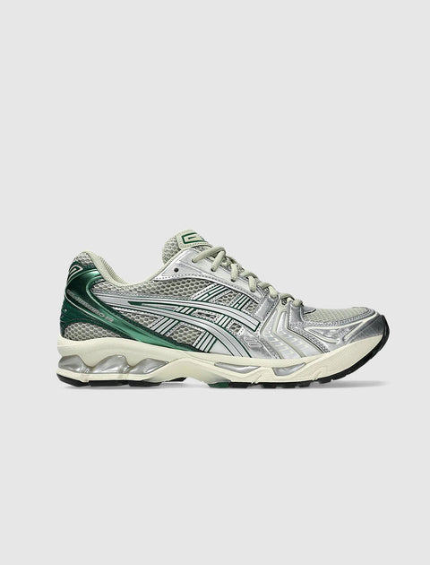 Men's running sneaker in silver, green, and beige with mesh and synthetic overlays