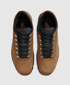 Brown suede low-top sneakers with black laces and metal eyelets, top view