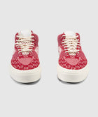 Front view of red and white knit high-top sneakers with white laces and rubber soles