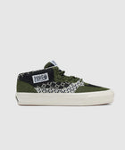 Green and black knit skate shoe with geometric check pattern and Half Cab label on side