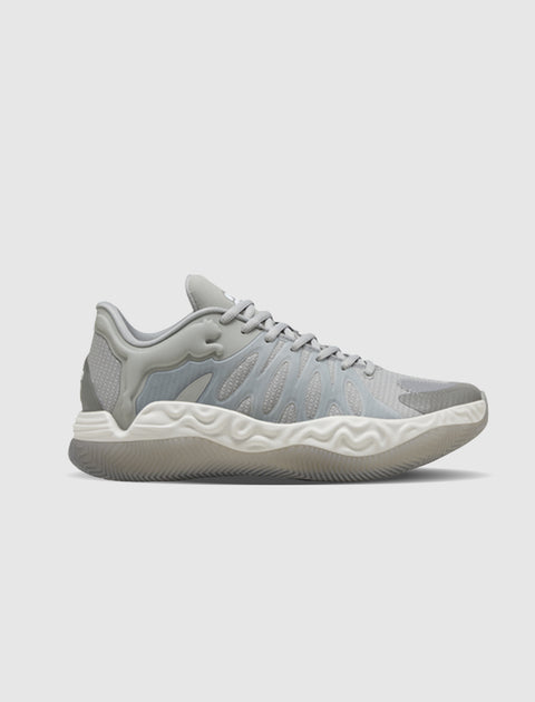 Grey athletic sneaker with textured sole and mesh upper, side profile on white background
