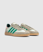 Mint green and beige suede low-top sneakers with green stripes and gum sole on white background