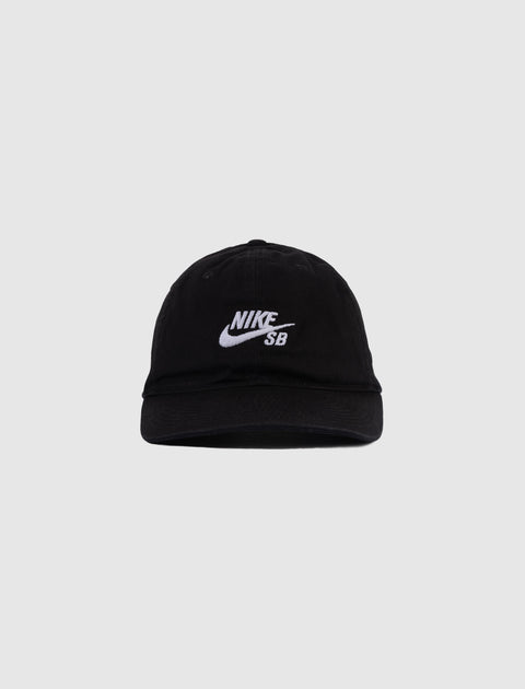 Black Nike SB dad hat with white embroidered logo, streetwear accessory