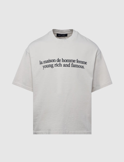 White streetwear t-shirt with black text graphic, relaxed fit, short sleeves, crew neck