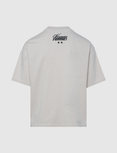 White streetwear t-shirt with black Homme Femme logo on upper back and two stars below