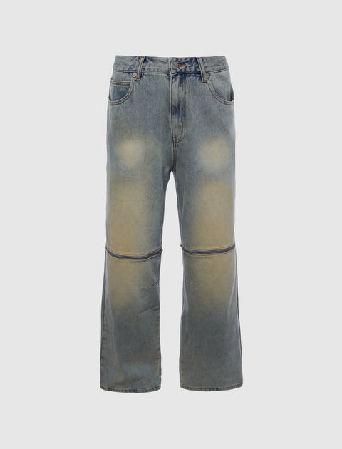 Men's stone wash straight leg denim jeans with faded knee panels and zip detail