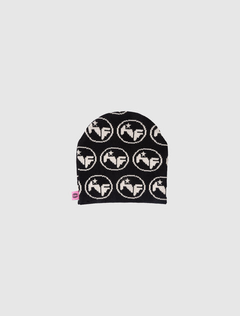 Black knit beanie with white circular logo pattern and a pink tag on the side.