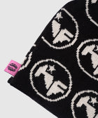 Black knit beanie with white graphic logos and a pink woven label, streetwear accessory
