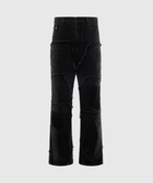 Black distressed denim jeans with frayed patchwork and relaxed fit, streetwear style