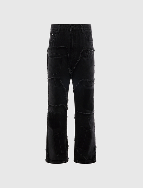Black distressed denim jeans with frayed patchwork and relaxed fit, streetwear style
