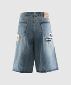 Back view of men's denim shorts with patches and large back pockets on neutral background