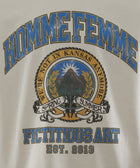White streetwear t-shirt with blue and yellow graphic text and mountain crest detail.