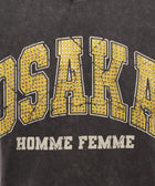 Black streetwear t-shirt with yellow studded 'OSAKA' text and 'HOMME FEMME' print