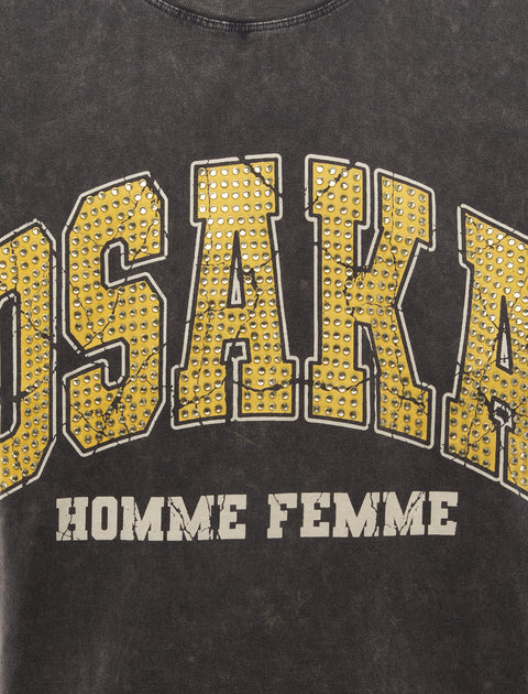 Black streetwear t-shirt with yellow studded 'OSAKA' text and 'HOMME FEMME' print