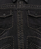 Black denim jacket with metal stud detailing and front flap pockets, streetwear style