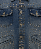 Close-up of blue denim jacket with silver studs and decorative metal buttons