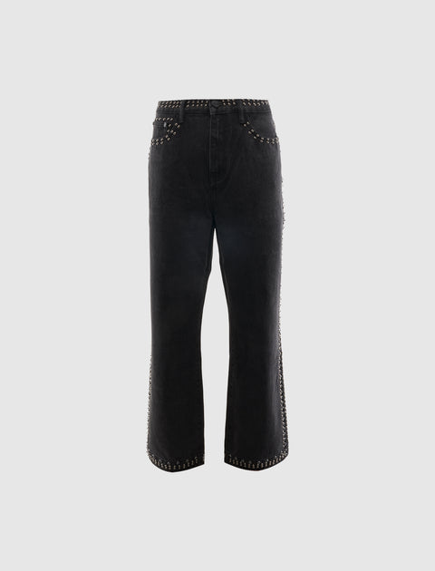 Black straight-leg jeans with silver stud detailing on waistband, pockets, and seams