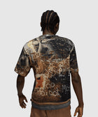 Back view of man wearing Air Jordan graphic t-shirt with graffiti brick wall print