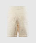 Back view of cream fleece men's streetwear shorts with two rear pockets