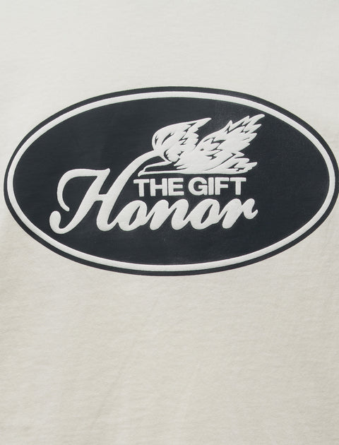 White streetwear t-shirt with black oval graphic and 'The Gift Honor' text on chest