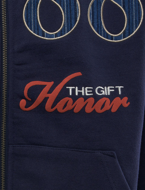 Navy streetwear hoodie with 'Honor The Gift' embroidered in red and white letters