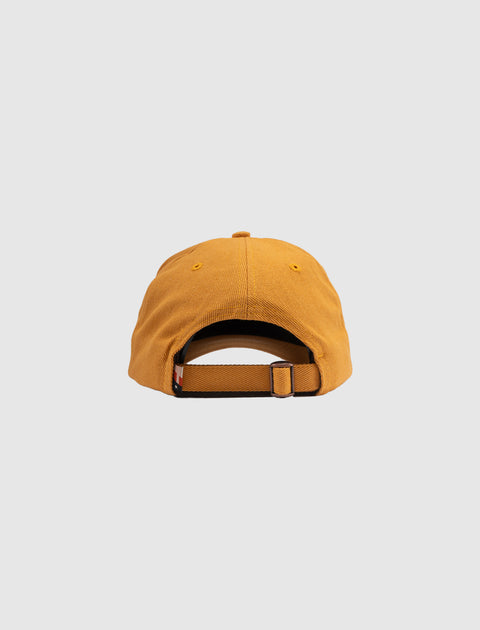 Back view of mustard yellow adjustable streetwear cap on white background