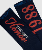 Navy streetwear socks with red 'Honor 1988' and 'THE GIFT' text, ribbed texture
