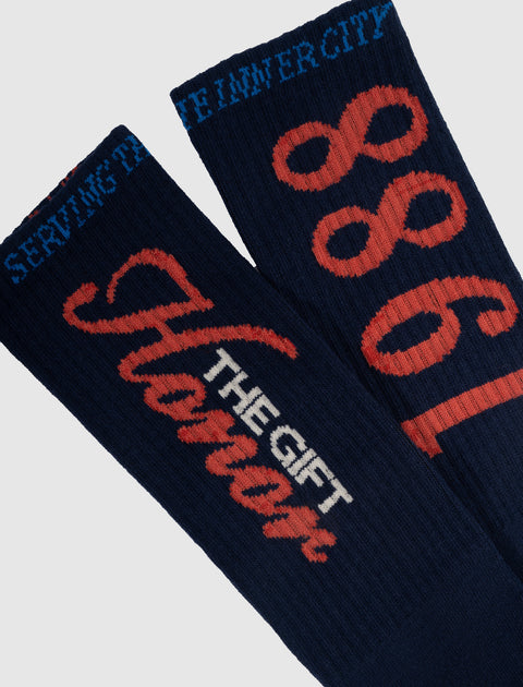 Navy streetwear socks with red 'Honor 1988' and 'THE GIFT' text, ribbed texture