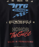 Black streetwear T-shirt with bold graphic text, racing motifs, and 'Honor The Gift' in red script.