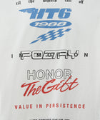White streetwear graphic tee with blue, black, and red racing-inspired text and bold lettering.