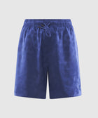 Men’s blue streetwear shorts with subtle polka dot pattern and drawstring waist