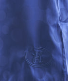 Blue streetwear fabric with embossed dots and embroidered H logo patch