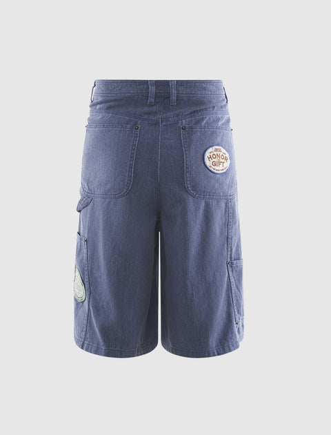 Blue denim men's shorts with back pockets and honor gift patch detailing