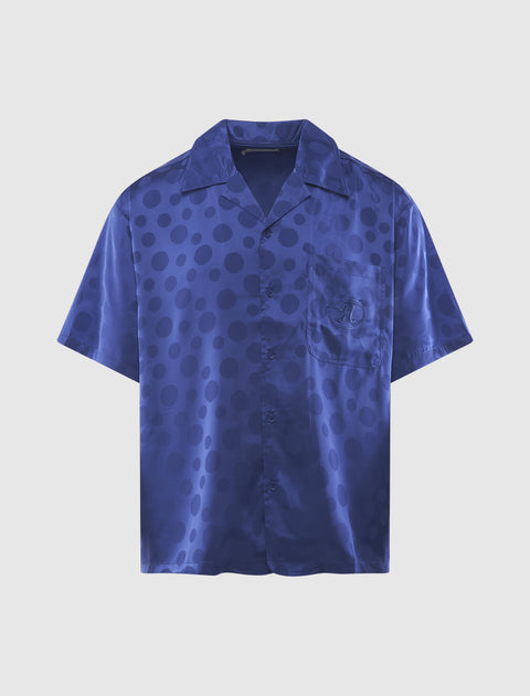Men’s blue short sleeve button-up shirt with subtle polka dot pattern and chest pocket