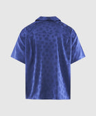 Back view of men's blue satin short sleeve shirt with subtle polka dot pattern