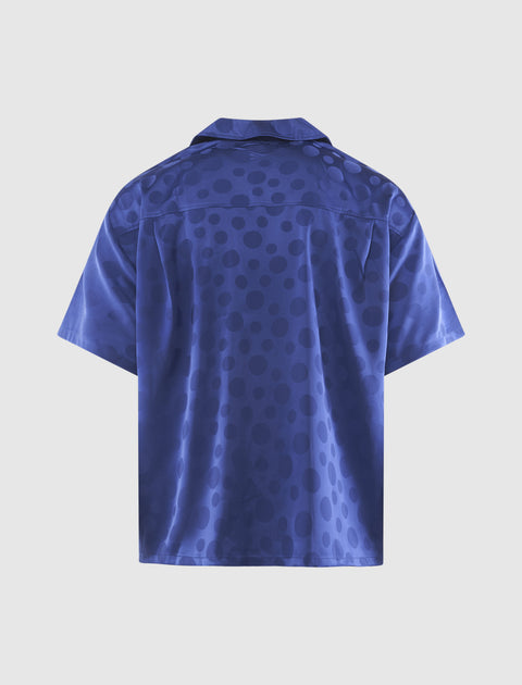 Back view of men's blue satin short sleeve shirt with subtle polka dot pattern