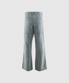 Wide-leg light wash denim jeans with back patch pockets, streetwear style
