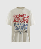 Off-white streetwear t-shirt with colorful graphic text and artistic doodles on the front