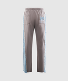 Men's grey streetwear pants with light blue frayed denim side panels and back pockets