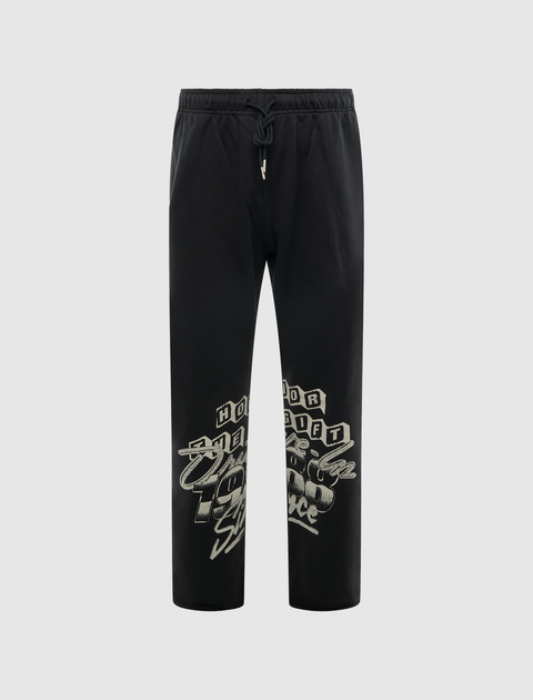 Black streetwear sweatpants with elastic waist and bold graphic lettering on lower legs