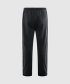 Back view of black streetwear pants with elastic waistband and single rear pocket