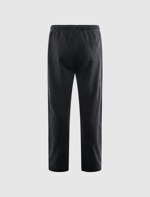 Back view of black streetwear pants with elastic waistband and single rear pocket