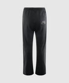 Back view of black men's streetwear pants with graphic text on pocket