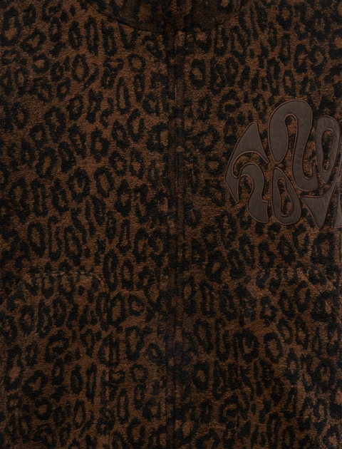 Close-up of brown leopard print fleece jacket with abstract patch detail
